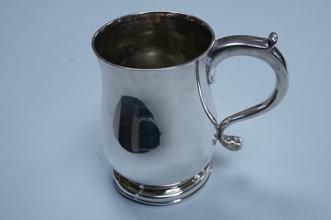 A George VI small silver baluster christening mug, William Comyns & Sons Ltd, London, 1937, height 95mm, 6.8oz.